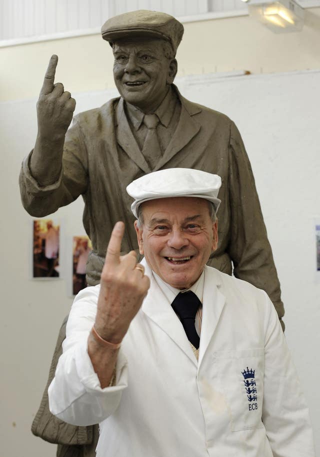 Dickie Bird with a cast of the sculpture that was erected of him in Barnsley