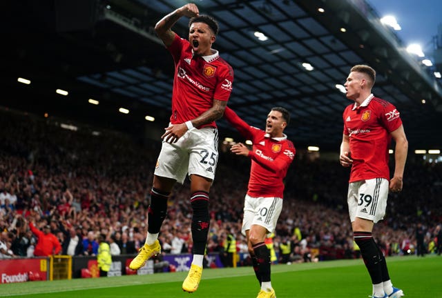 Jadon Sancho celebrates after opening the scoring