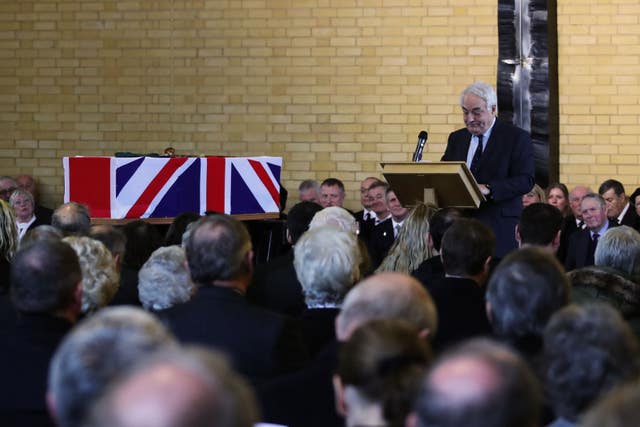 Dr Richard Page giving the eulogy during Surgeon Captain Rick Jolly’s funeral service (LPhot Ken Gaunt/Royal Navy/MoD/Crown copyright/PA)