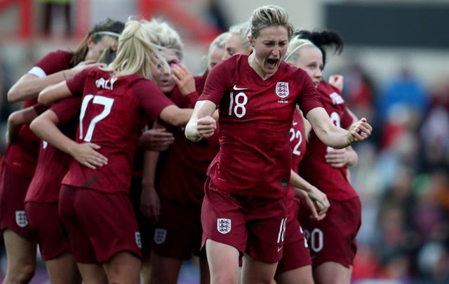 White celebrates after England go 1-0 up against Spain 