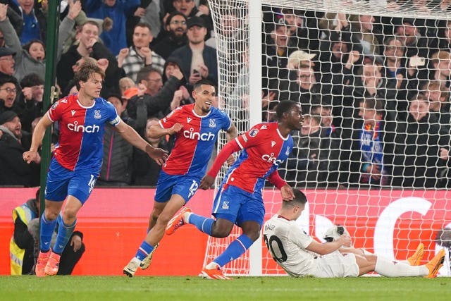 Tyrick Mitchell (centre right) celebrates scoring Crystal Palace''s third