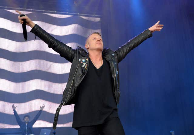 Macklemore on stage at Leeds Festival