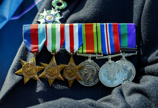 Mr Belcher’s medals from his service in the armed forces