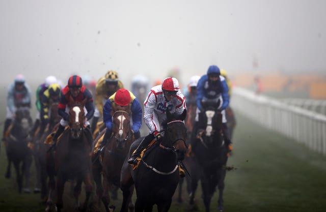On To Victory, ridden by James Doyle, wins the Betfair November Handicap at a foggy Doncaster