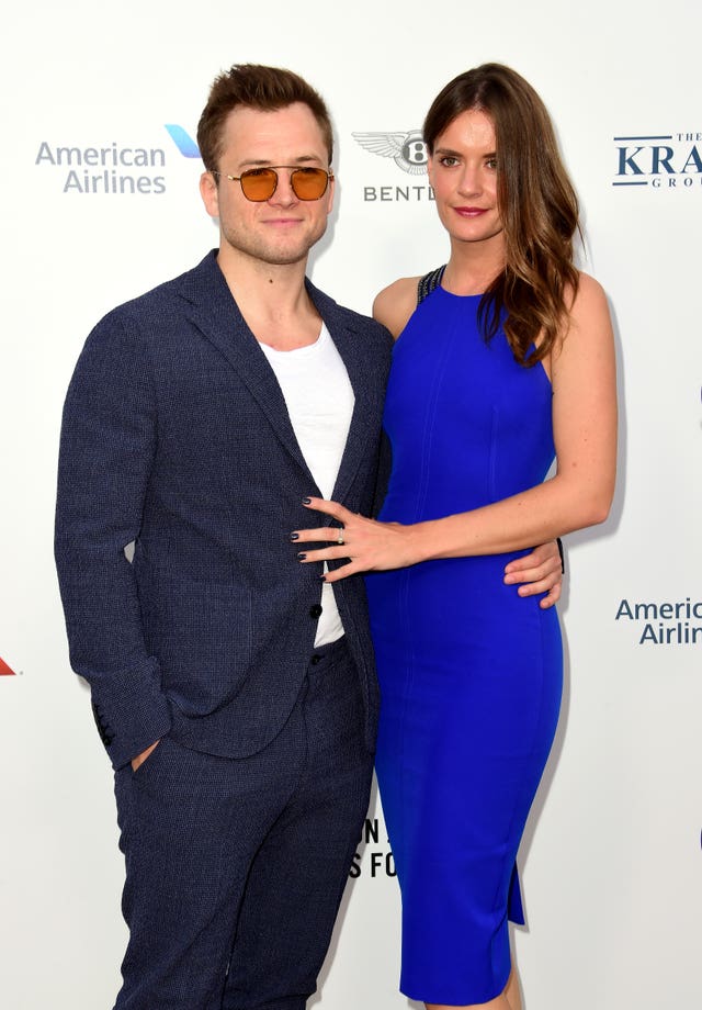Taron Egerton (left) and Emily Thomas
