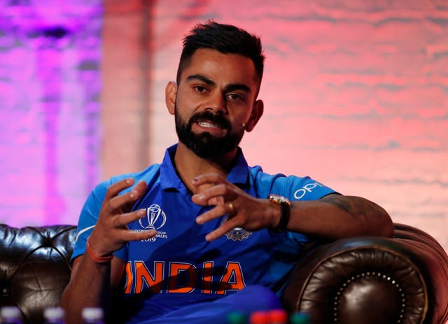 Virat Kohli attempted to play down the significance of the clash against Pakistan (Andrew Boyers/Pool)