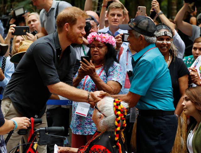 The Duke of Sussex greets people during a dedication ceremony of the forests of K'gari to the Queen's Commonwealth Canopy on Fraser Island (Phil Noble/PA)