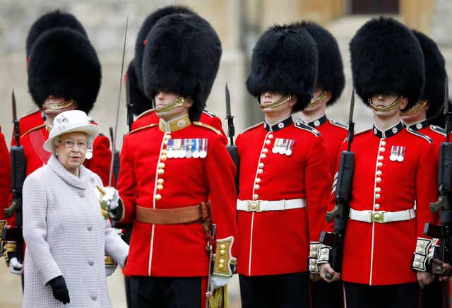 Queen presents colours to Coldstream Guards