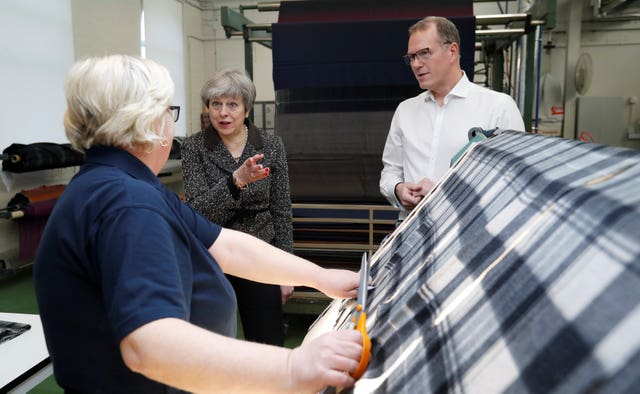 Mrs May visits textile producers Alex Begg in Ayrshire (Russell Cheyne/PA)