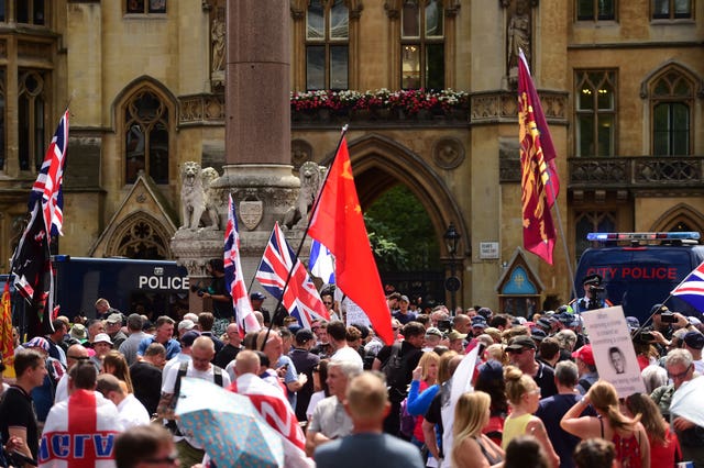 Tommy Robinson supporters in Westminster, London, after he was jailed for nine months for contempt of court