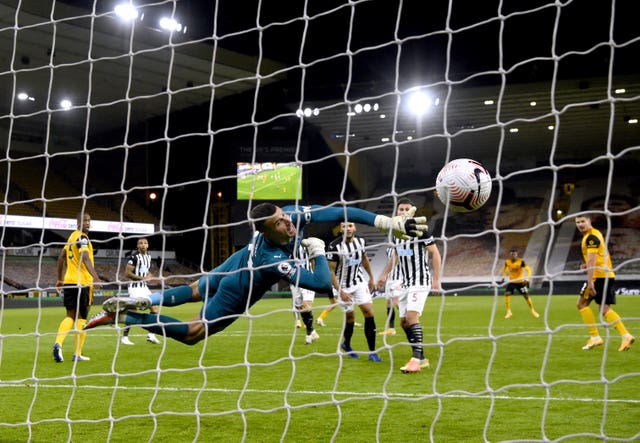 Karl Darlow looks as Raul Jimenez's shot beats him.