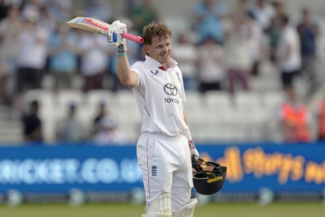 Ollie Pope celebrates scoring a century