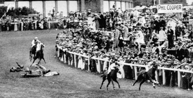 Epsom racecourse was the site of the most famous protest in which Emily Davison was fatally injured after running onto the course (PA)