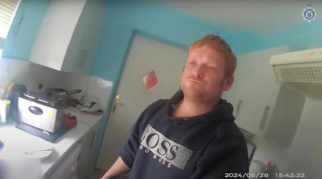 Image taken from the body-worn video footage of police officers speaking to Matthew Higgins