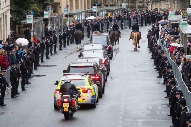 Members of the public line Saint Aldate’s in Oxford