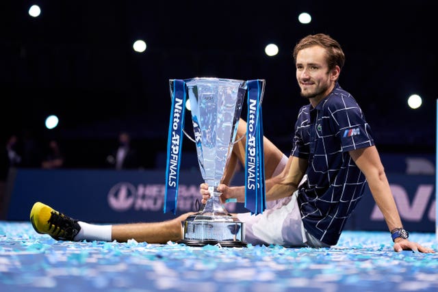Daniil Medvedev poses with the ATP Finals trophy