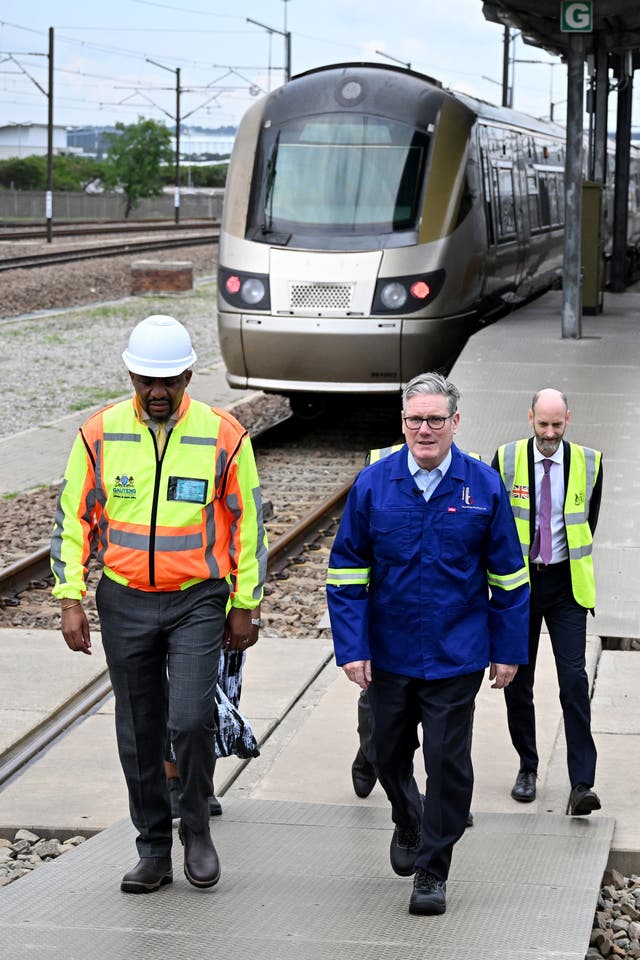 Prime Minister Sir Keir Starmer visits a Johannesburg train depot with UK-built carriages