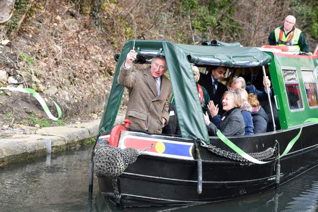 Prince Charles took a ride on a narrowboat (Ben Birchall/PA)