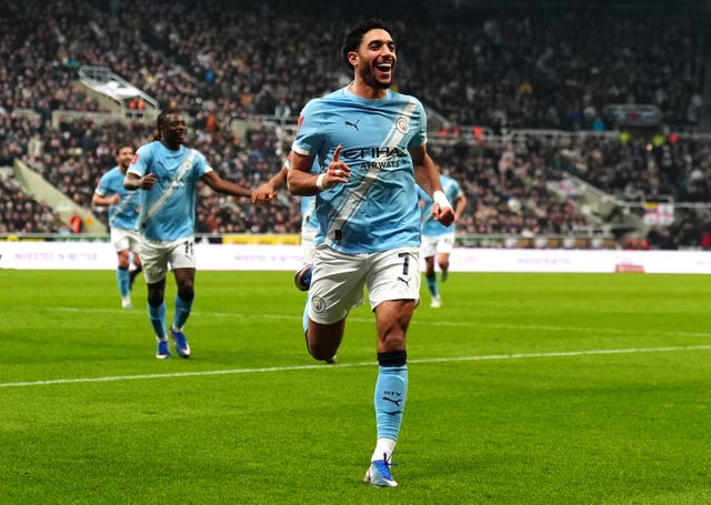 Omar Marmoush celebrates scoring a goal for Manchester City