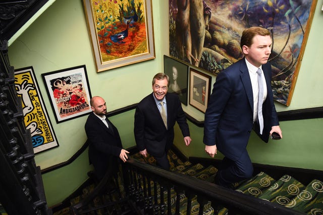 George Cottrell and Nigel Farage on a staircase