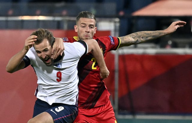 Tottenham team-mates Harry Kane and Toby Alderweireld fight for the ball 