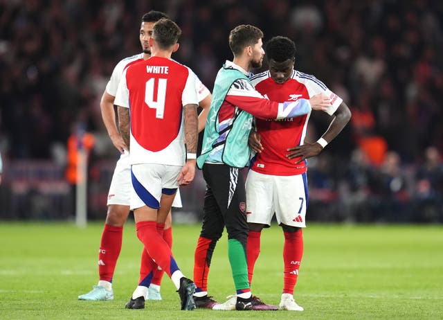 Bukayo Saka is consoled by Jorginho