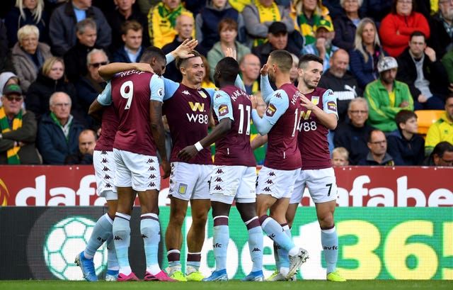 Jack Grealish celebrates scoring Villa's third goal