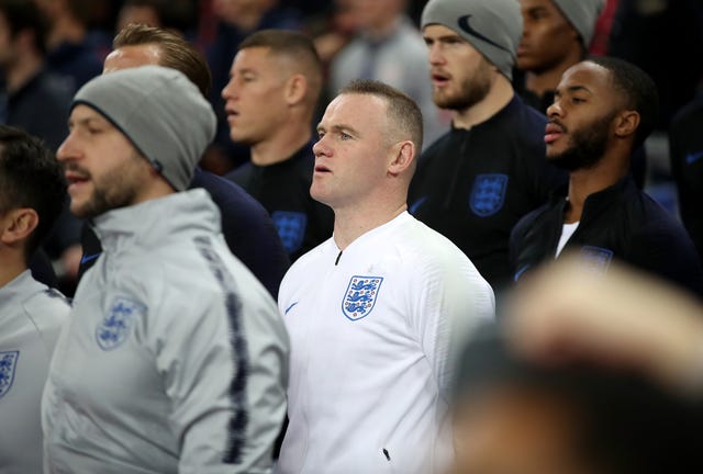 Rooney sings the national anthem
