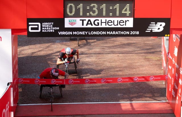 David Weir crosses the line to win the men’s wheelchair London Marathon in 2018