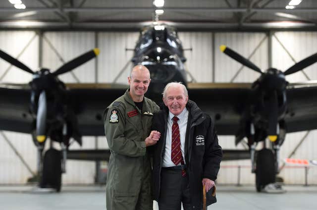 Commanding officer of 617 squadron, Wing Commander John Butcher with Johnny Johnson (Joe Giddens/PA)