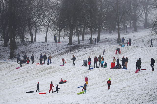 People sledging in Queen’s Park in Glasgow