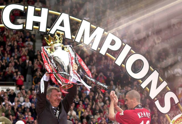 Sir Alex Ferguson lifts the 2001 Premier League trophy