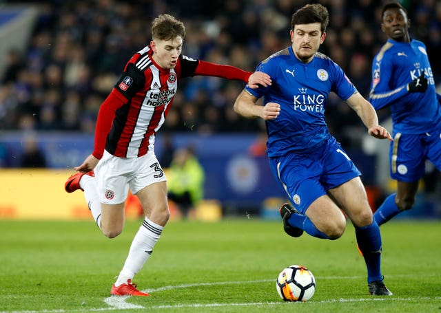 David Brooks, left, in action for Sheffield United against Leicester's Harry Maguire