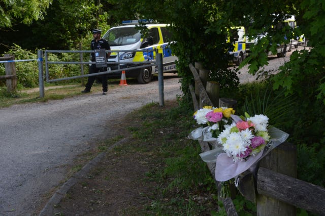 Flowers left outside Havant Thicket in Hampshire, where the body of 16-year-old Louise Smith was found