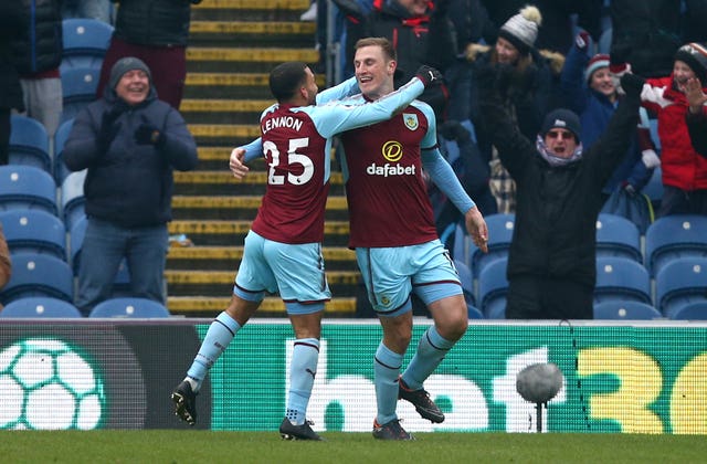 Burnley’s Chris Wood (right) celebrates scoring the winner (Dave Thompson/PA)