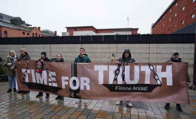 Campaigners outside Belfast High Court during a challenge to the Legacy Act