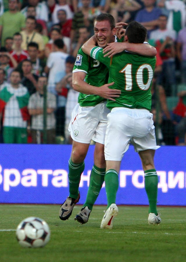 Republic of Ireland defender Richard Dunne is congratulated by Robbie Keane after scoring in Sofia