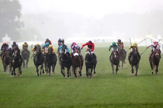Significantly (red silks, centre right) on his way to winning the Palace of Holyroodhouse Stakes