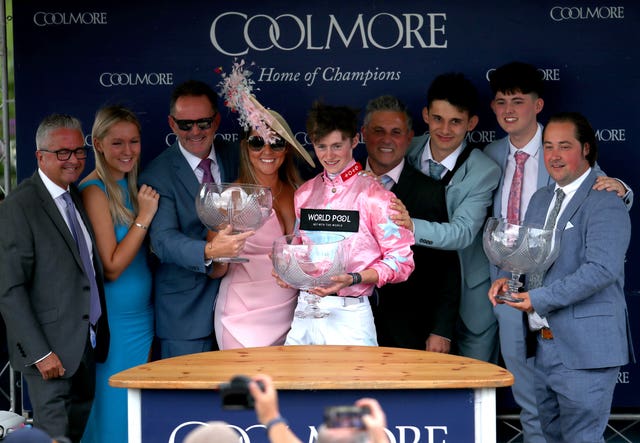Jockey Sean Kirrane, trainer Adam West (right) and the winning connections celebrate winning the Nunthorpe
