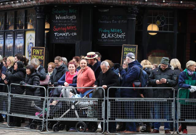 Crowds waiting for the royal couple to arrive for a walkabout in Belfast City centre (Peter Byrne/PA)