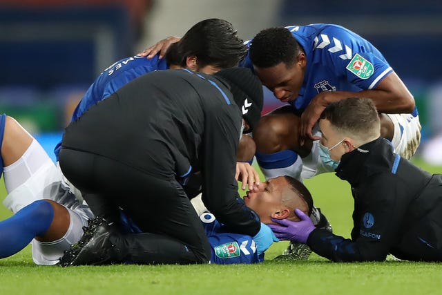 Richarlison receives treatment for a head injury