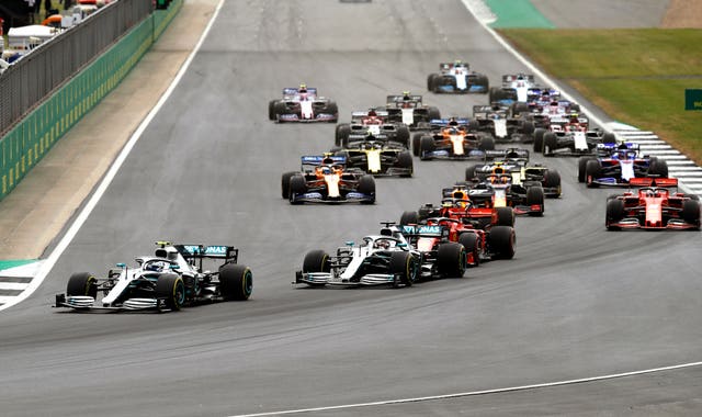 Valtteri Bottas and Lewis Mercedes team-mate Hamilton into the first corner of the British Grand Prix at Silverstone
