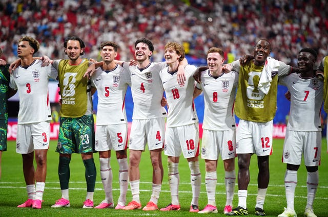England players celebrate with fans after their victory over DR Congo