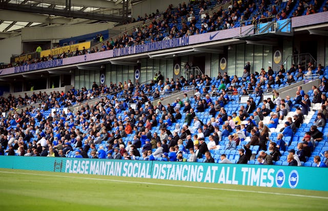 Brighton fans adhere to social distancing in the friendly against Chelsea (Adam Davy/PA)
