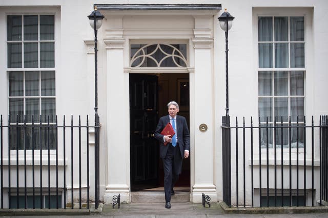 Chancellor of the Exchequer Philip Hammond heads to the House of Commons to deliver his first spring statement. (Stefan Rousseau/PA)