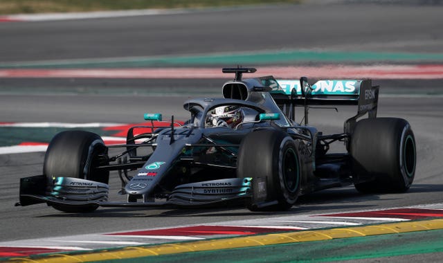 Lewis Hamilton hits the track on day four of the opening test