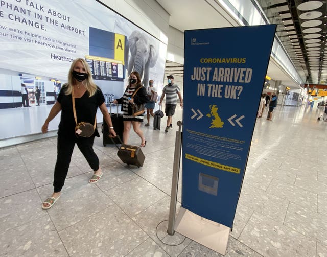 Passengers arrive at Heathrow Airport