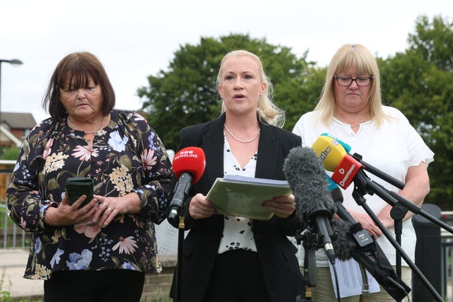 PSNI Detective Chief Inspector Claire McDonald (centre) with family members of affected patients, Tanya (right) and Shirley, outside Craigavon Crown Court