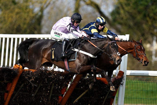 Addosh ridden by jockey Ciaran Gethings (right) on their way to winning the Racing TV Fillies’ Juvenile Hurdle