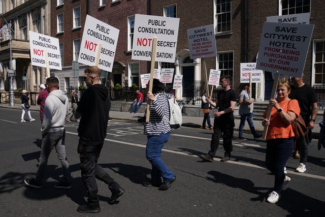 People demonstrating outside Leinster House in Dublin